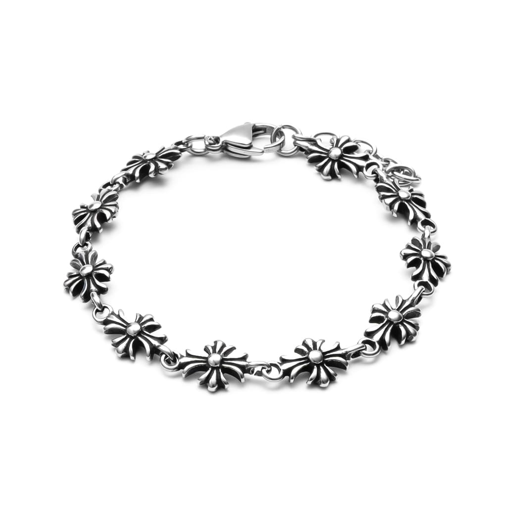Silver floral bracelet on a white background